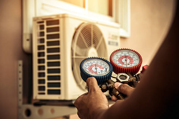 Professional Heat Pump Repair technician working in Huntertown, IN